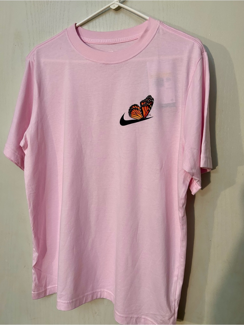 Nike Pink T‑Shirt with Monarch Butterfly Logo